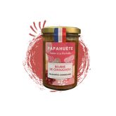 Jar of Papahuète’s chouchou (caramel peanut) butter, with French flag on the lid and red graphic background.