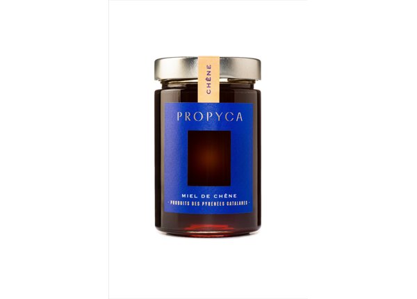 Jar of oak honey from the Propcyca brand, product of the Catalan Pyrenees.